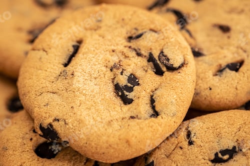 Preview: Cookies with chocolate chips close-up, food background.