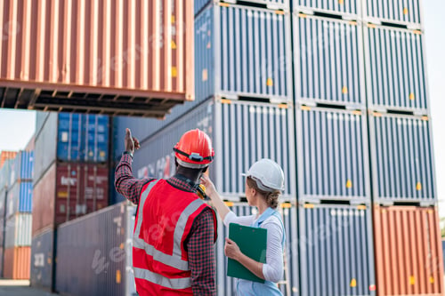 Preview: foreman checking containers in the terminal, at import and export business logistic company.