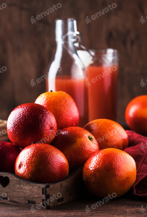 Preview: Juicy ripe shiny red bloody oranges in tray for making refreshing cocktail