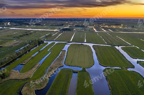 Preview: Aerial view of Sunset over Historic dutch Waterland