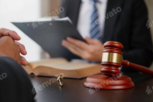 Preview: Lawyer or judge provides legal advice to clients in the courtroom. including the impartiality of the