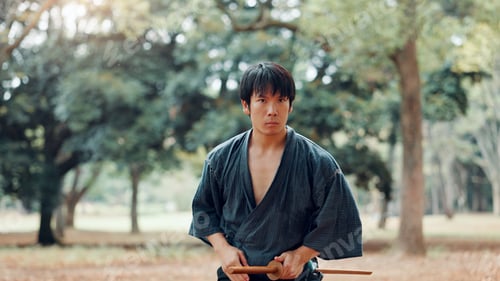 Preview: Man, fitness or outdoor with sword for martial arts, demonstration or training tradition in Kyoto.