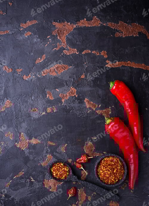 Preview: Red chili pepper on old rusty background
