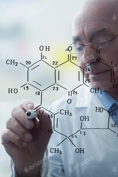 Preview: Senior male scientist writing molecular formula on clear board