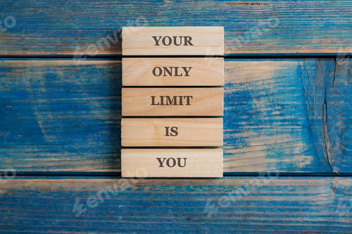 Preview: Your only limit is you sign written on a stack of five wooden pegs