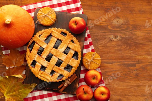 Preview: Homemade traditional sweet autumn tart pie on wooden table