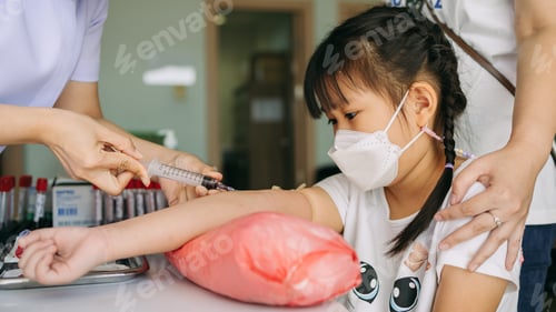 Preview: little kid was blood draw by doctor at the clinic