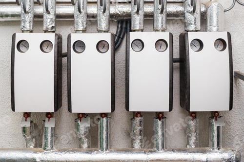 Preview: Group of hot water circulating pumps installed in boiler room