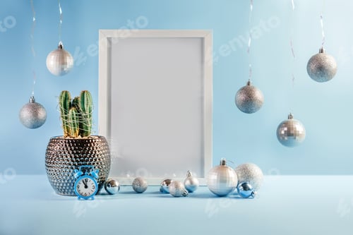Preview: Christmas mock-up with white frame, cactus and Christmas balls on blue background