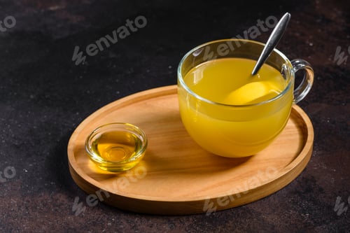 Preview: Tea with sea buckthorn on dark background
