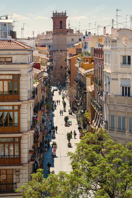 Preview: View at Valencia downtown with people walking in the street. Rooftops of Valencia downtown. Spain.