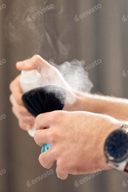 Preview: barber holding brush for talco in barber shop