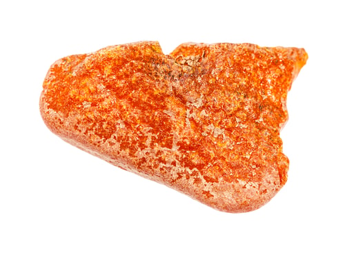 Preview: raw unpeeled Amber nugget isolated on white