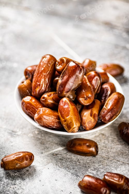 Preview: Full bowl with dates on the table.