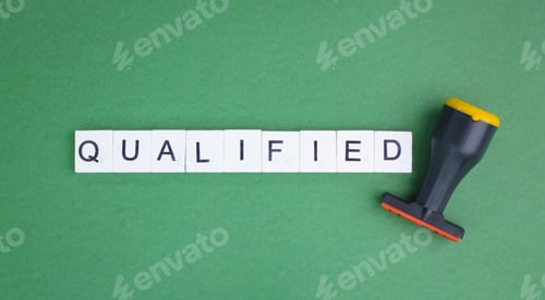 Preview: stamps and letters of the alphabet with the word qualified.