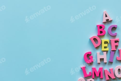 Preview: learn english language. alphabet abc letters on blue background with copy space