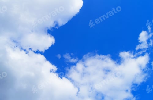 Preview: Beautiful blue sky background with white fluffy clouds