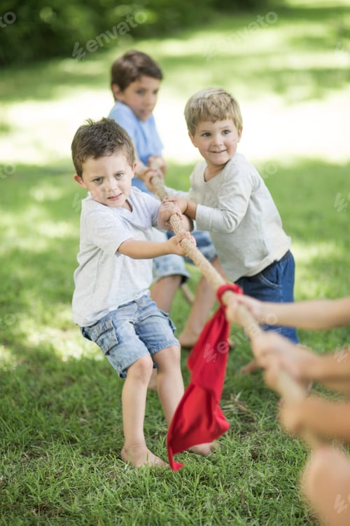 Preview: Kids in garden playing tug of war