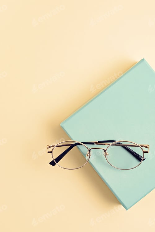 Preview: Stylish eyeglasses over pastel background. Optical store, glasses selection, eye test, vision