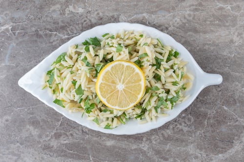 Preview: Toothsome pasta with green vegetables , on the marble background