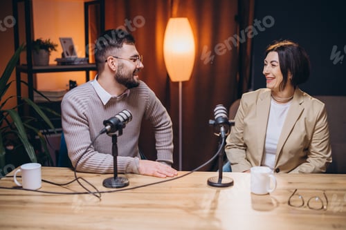 Preview: Professional podcasters speaking into microphones, collaborating