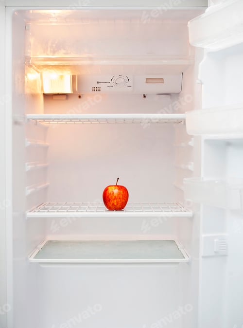 Preview: Empty Fridge With Red Apple