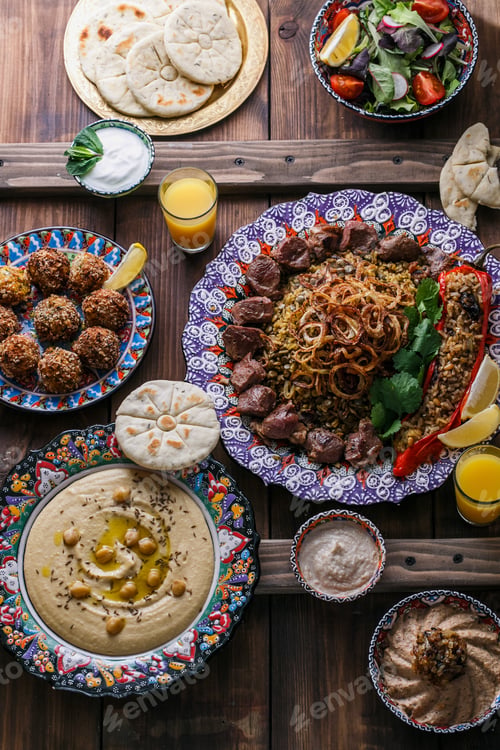 Preview: Middle eastern or arabic dishes and assorted meze on a dark background