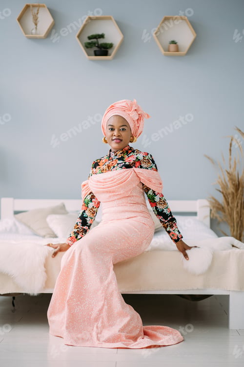 Preview: Beautiful smiling woman with bright makeup against light studio background. Studio shot of female