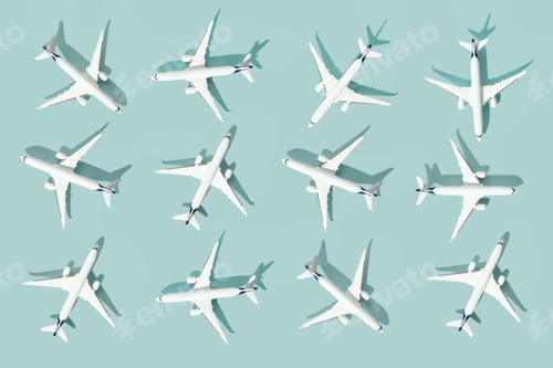 Preview: white passenger plane on pastel blue background