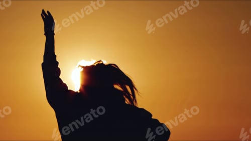 Preview: Young Woman Silhouette in Sunset