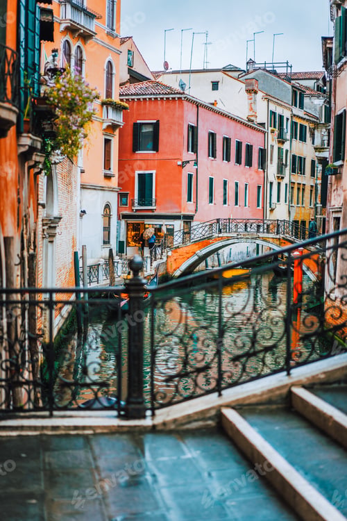 Preview: Venice, Italy. The bridge and the colored houses on the shore of a narrow channel