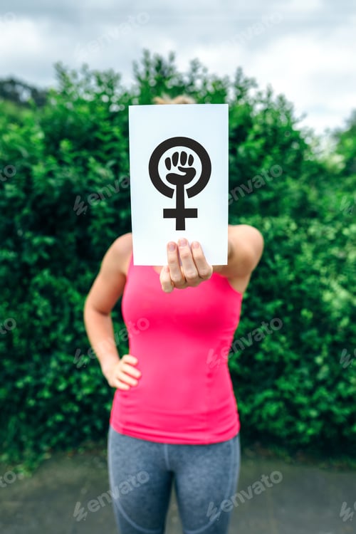 Preview: Woman showing symbol of feminism