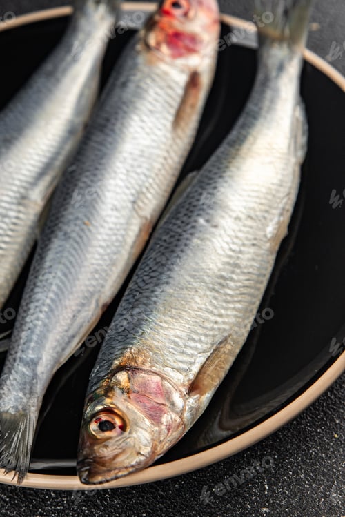 Preview: fish herring fresh raw seafood eating cooking meal food snack on the table copy space food