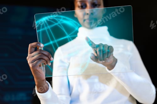 Preview: African American woman using transparent tablet futuristic technology