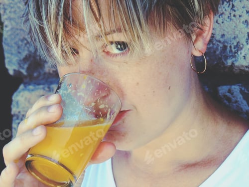 Close Up of Drink with Blond Hair