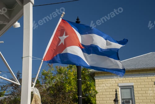 Preview: Closeup shot of Cuba flag tied on a post
