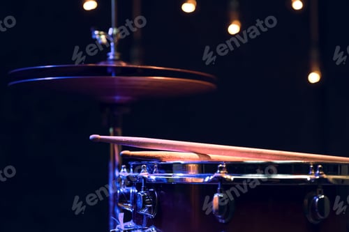 Preview: Snare drum and hi-hat in the dark close up.