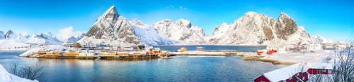 Preview: Fabulous winter view of Sakrisoy village and snowy mountaines on background.