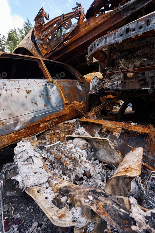 Preview: Metal scrap car debris lying in war torn Ukrainian city