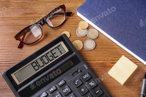 Preview: Budget plan. Calculator, glasses, coins and notebook on wooden table, above view