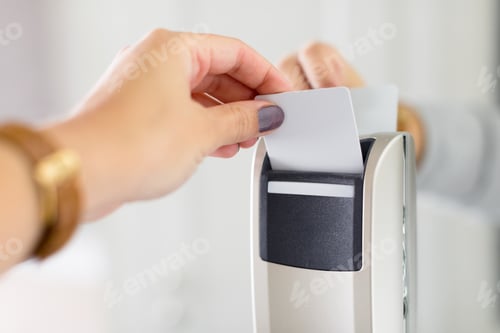 Preview: Close up of female hand opening keycard electronic lock