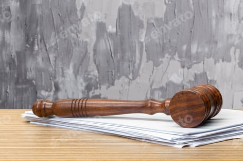 Preview: judge hammer on white paper and table