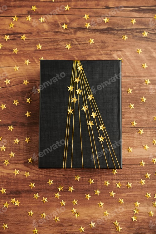 Preview: Gift Decorated with Golden Stars