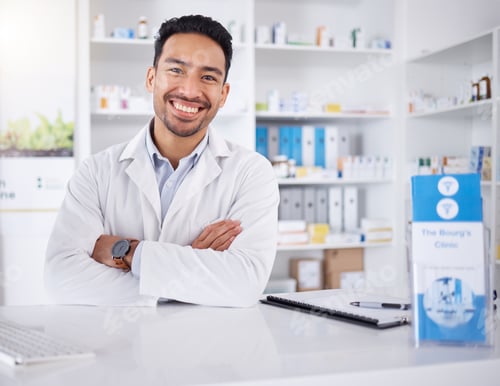 Preview: Asian man, portrait and pharmacist with arms crossed in pharmacy, drugstore or shop. Face, confiden