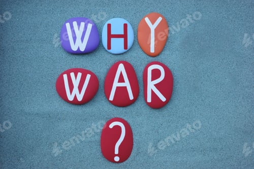 Preview: Why war, actual question composed with multi colored stone letters over green sand