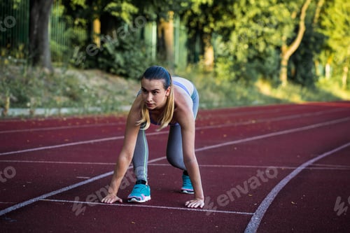 Preview: sports girl on the treadmill ready to run, close-up