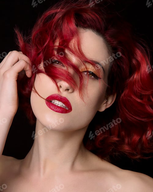 Preview: Red-haired woman with vibrant makeup