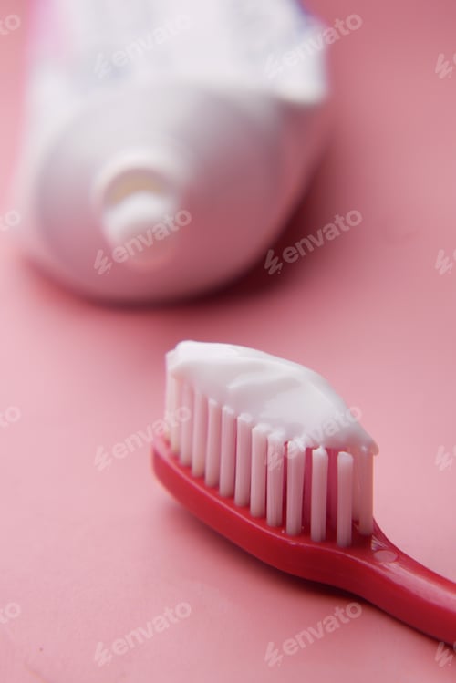 Preview: tooth brush and paste on pink