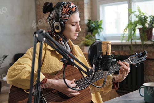 Preview: Woman playing guitar during air