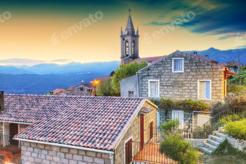 Preview: Majestic evening cityscape with Parish Church of the Assumption in Zonza village